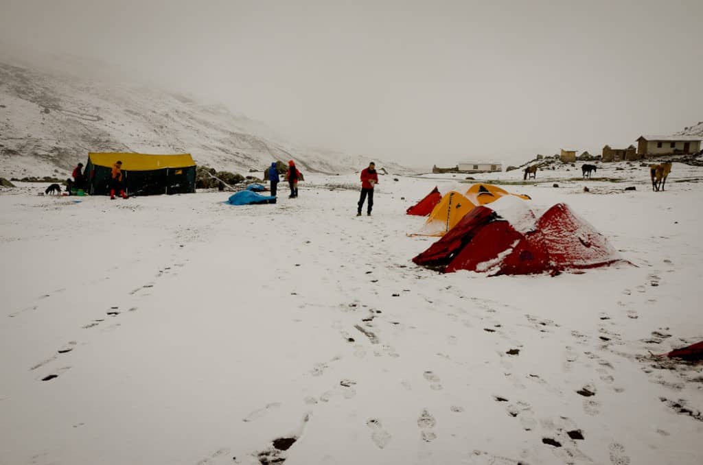 hiking-through-snow-in-peru