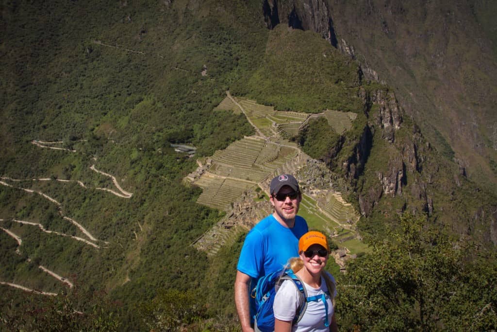 couple at machu picchu on romantic honeymoon in peru