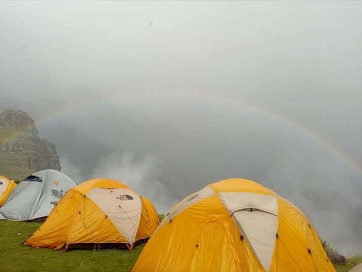 Apus Peru tents and rainbow