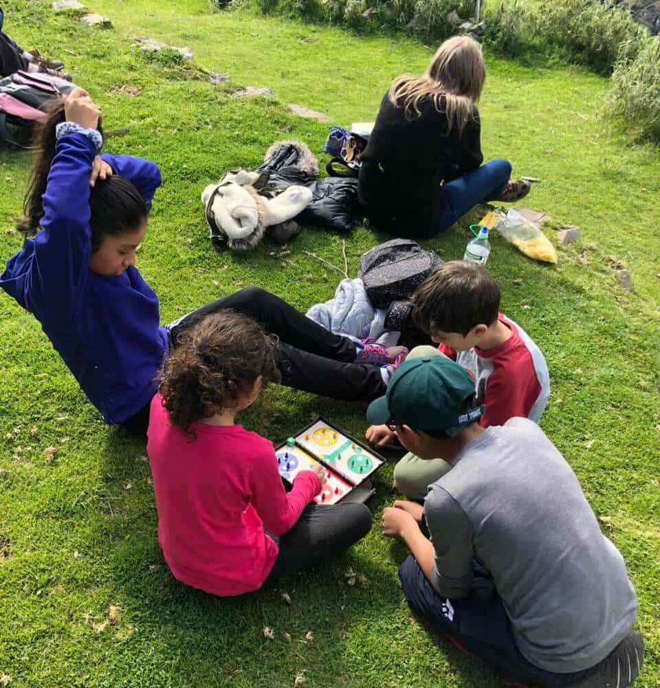 Kids play games during down time