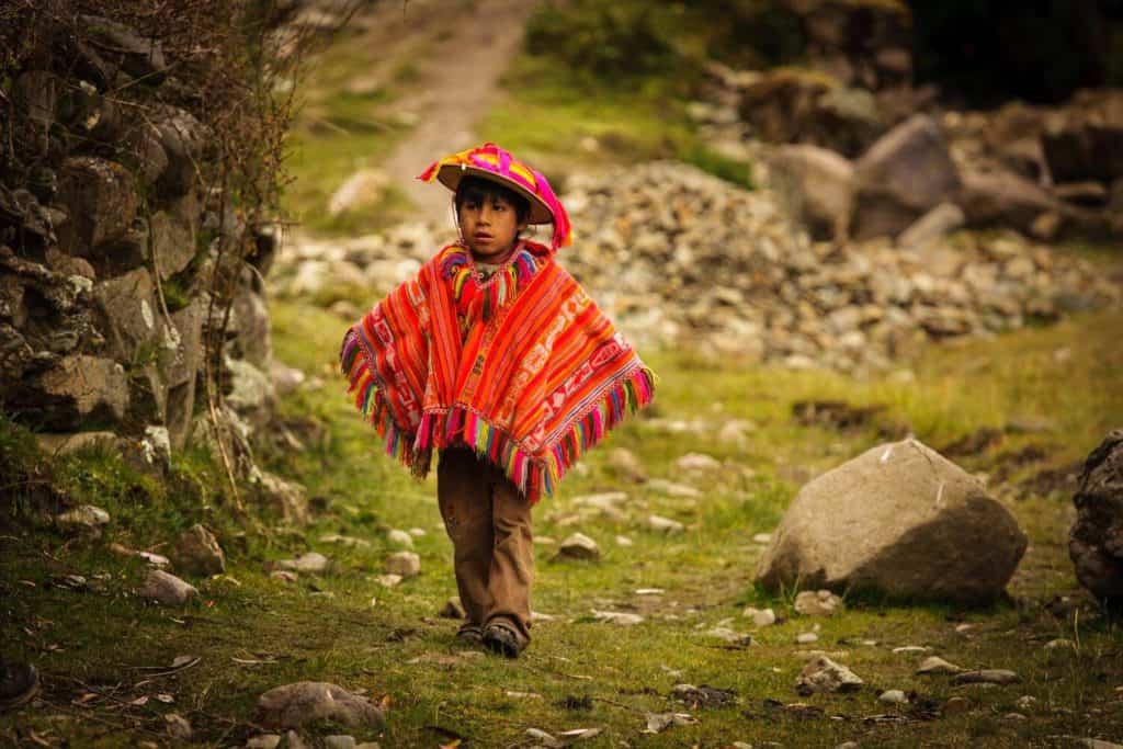 sustainable tourism examples, Peruvian boy