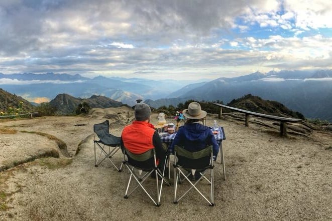 5 day private inca trail, people sitting on camping chairs in nature