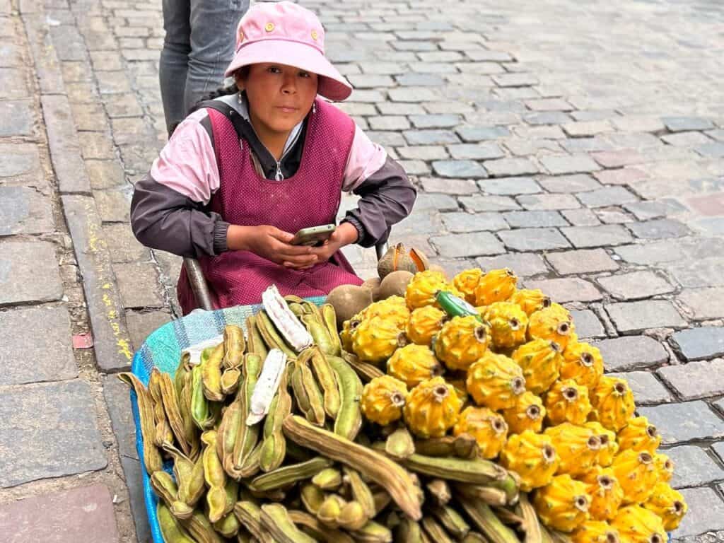 woman selling fruits in peru